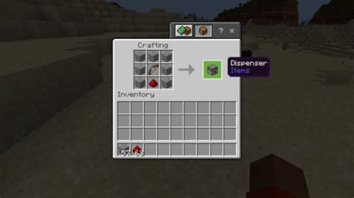 How do i make a dispenser in minecraft