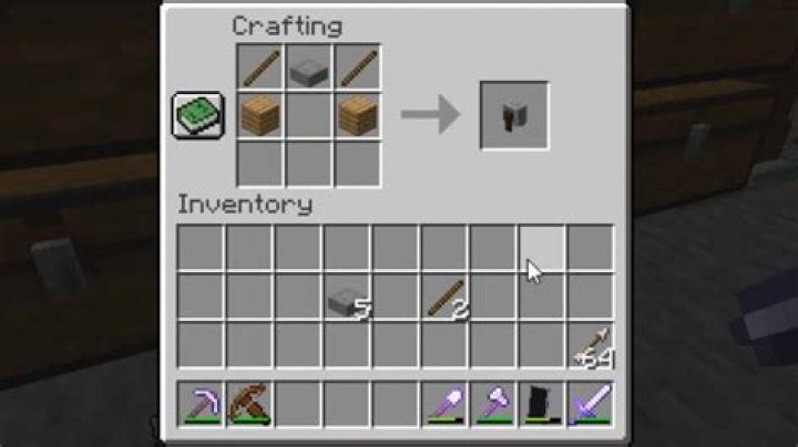 How do you make a grindstone in minecraft